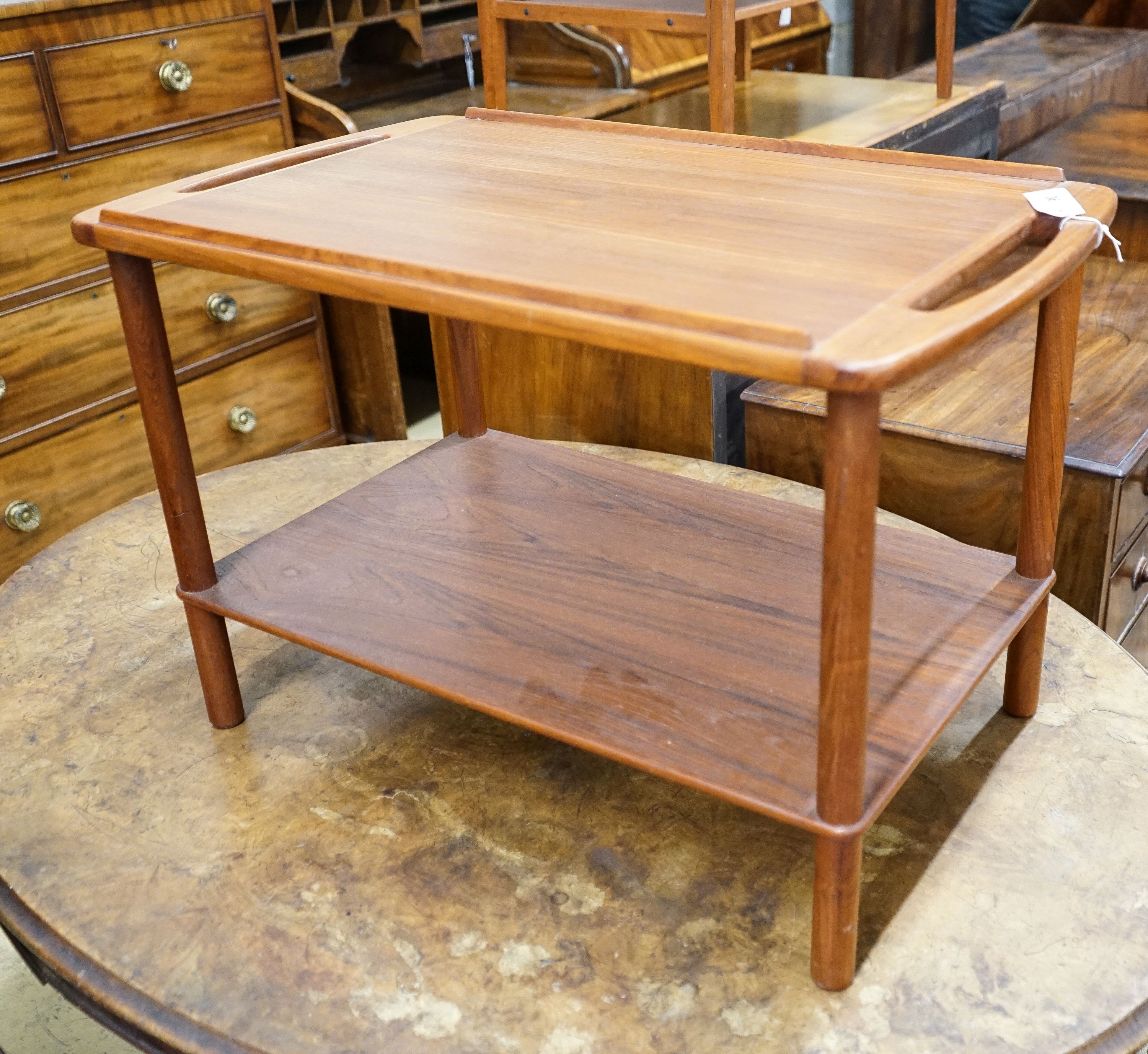 A mid century design Danish style teak two-tier occasional table, width 74cm, depth 44cm, height 48cm